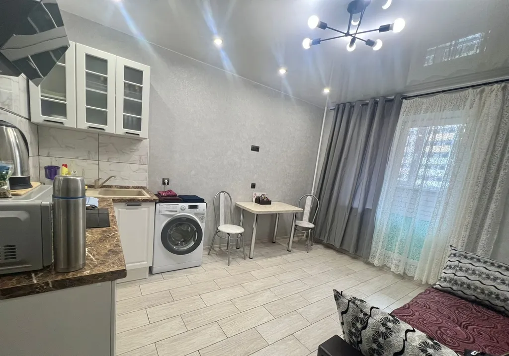 Двухкомнатная квартира с кухней-гостиной