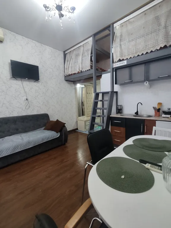 Уютная студия с балконом и видом на море