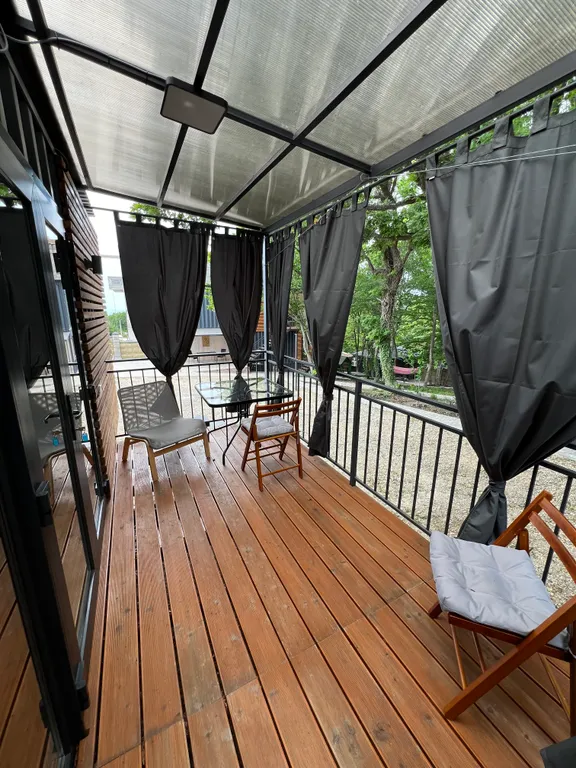 Домик в лесу у моря с верандой