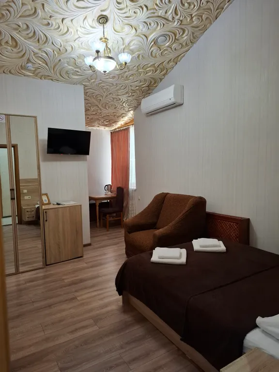 Номер в гостинице трёхместный улучшенный