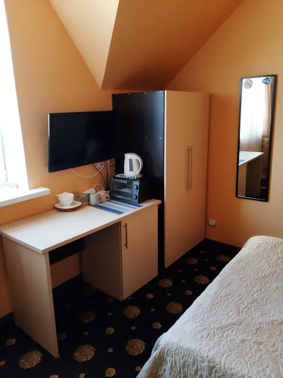 Уютная комната в трёхэтажной квартире в западной части города