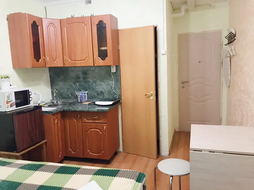 Уютная квартира-студия с двумя кроватями