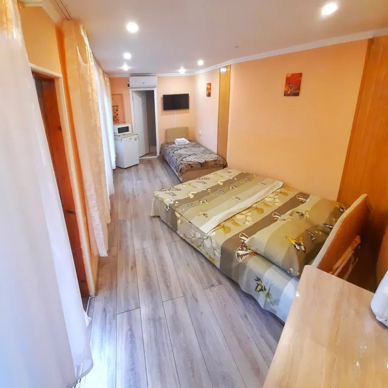 Этаж коттеджа в зелёном саду