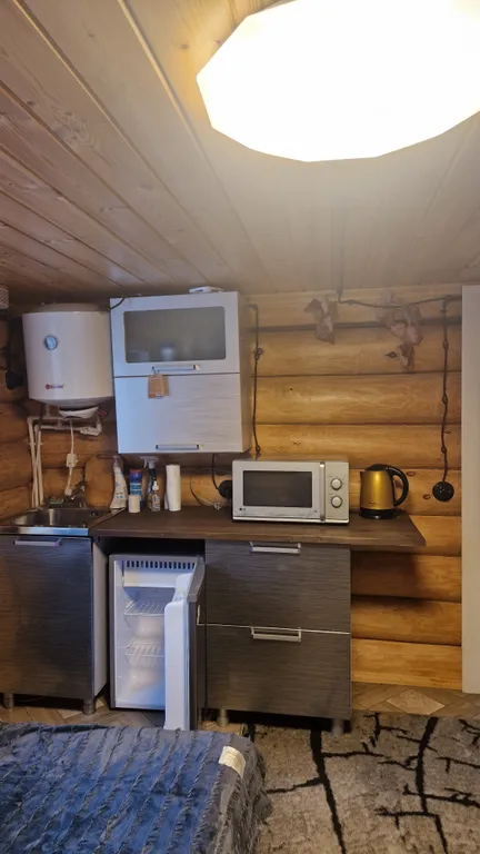 Бревенчатый новый дом с баней и банным чаном