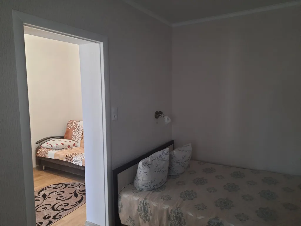 Номер с кухней в центре города со своим двориком