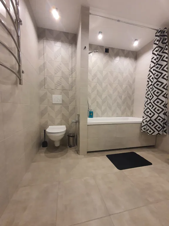 Новый апартамент с гостиной и тремя спальнями