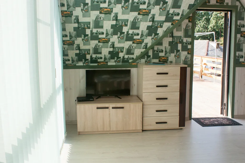 Номер кухонным уголком, просторной террасой и видом на море