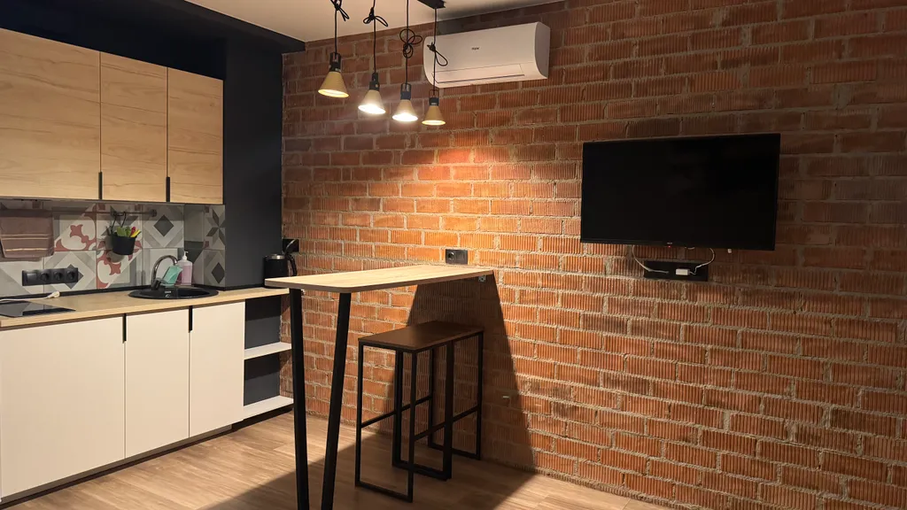 Большая студия в центре на 22 этаже с видом на реку и колесо обозрения