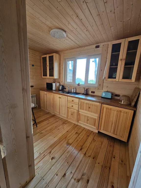 Просторный дом с баней и живым камином