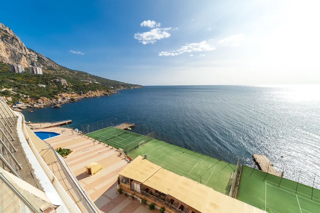 Апарт для семьи из 3 человек на берегу моря, с видовой террасой, кухней