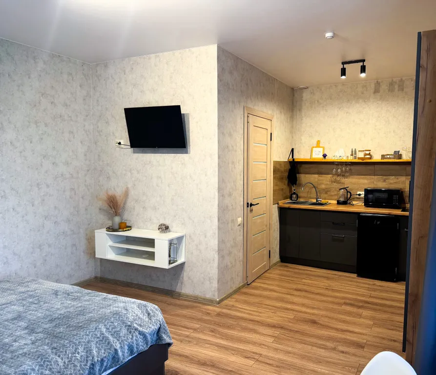 Квартира с личной верандой и парковкой