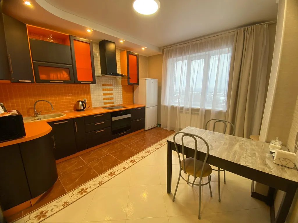 Уютная квартиpa в центрe города с прекрасным вечерним видом на город