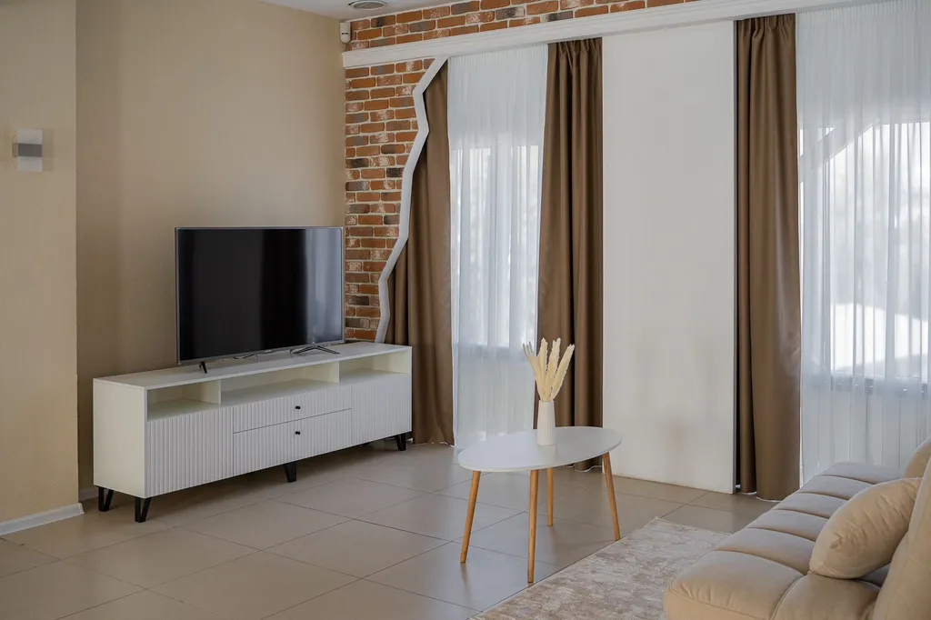 Уникальные апартаменты в центре города с панорамными окнами