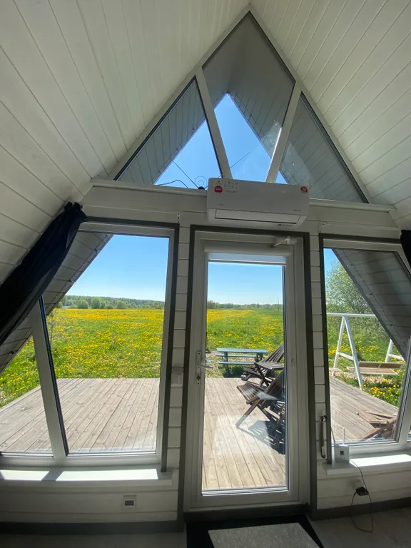 Треугольный дом