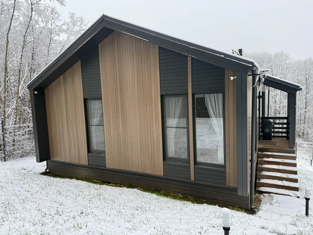 Семейный дом с панорамной сауной и камином