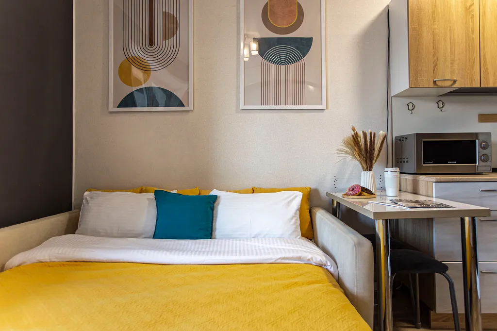 Уютная студия с красивым балконом