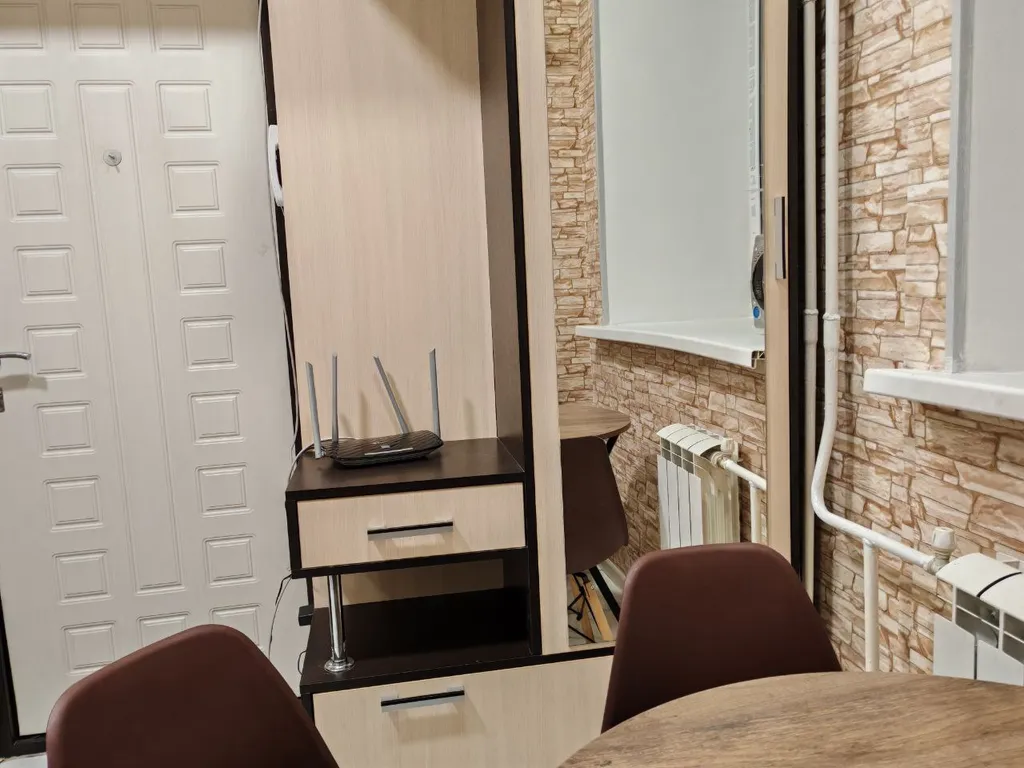 Светлая квартира с большими окнами и высокими потолками