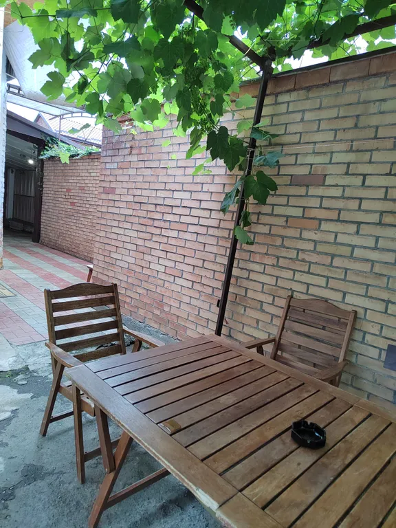 Уютный дом с садом в центре города