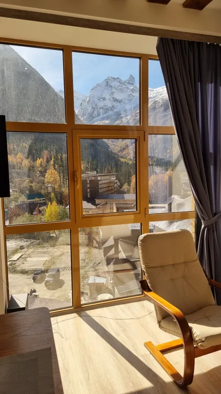 Апартаменты с восхитительными панорамными видами на вершины Домбая