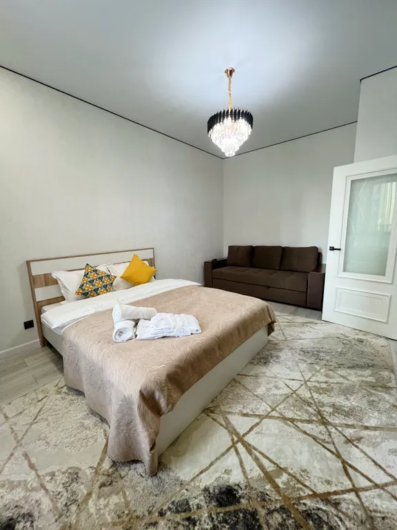 В центре, левый берег, рядом возле Хан Шатыр, кардиология, ННЦМД