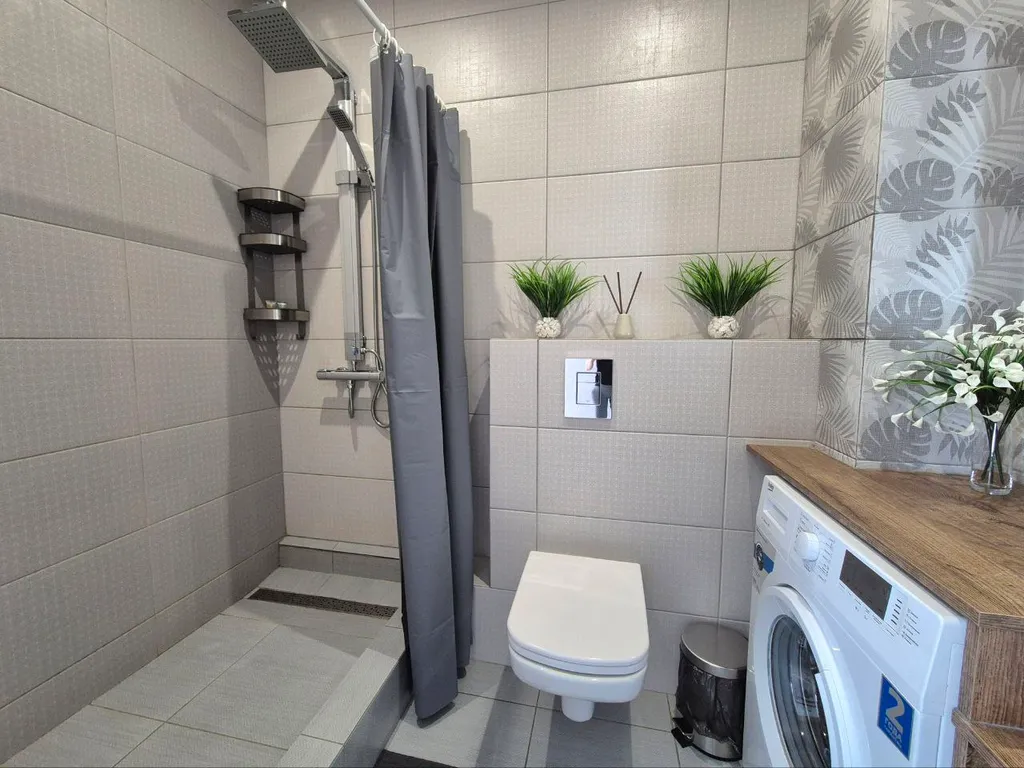 Уютная квартира Diamond в новом доме в центре города.