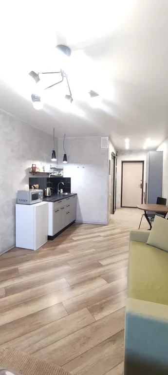 Уютная студия с видом на город