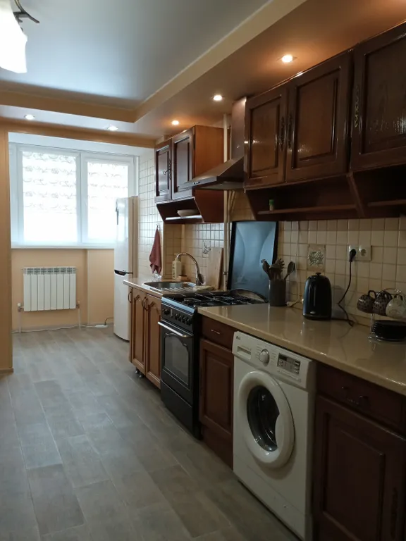 Квартира с видом на набережную и горы