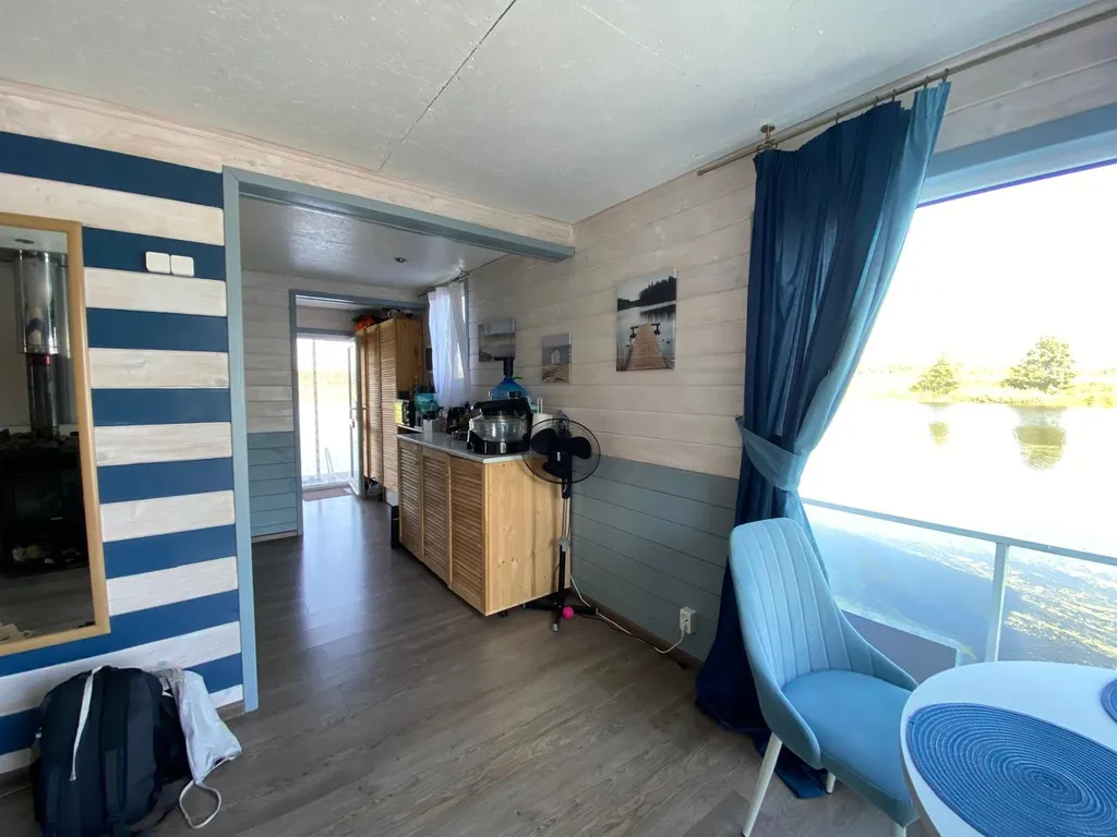 Дом на воде (Хаусбот) с баней и камином