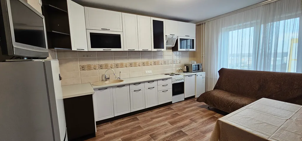 Современные трехкомнатные апартаменты на 14 этаже