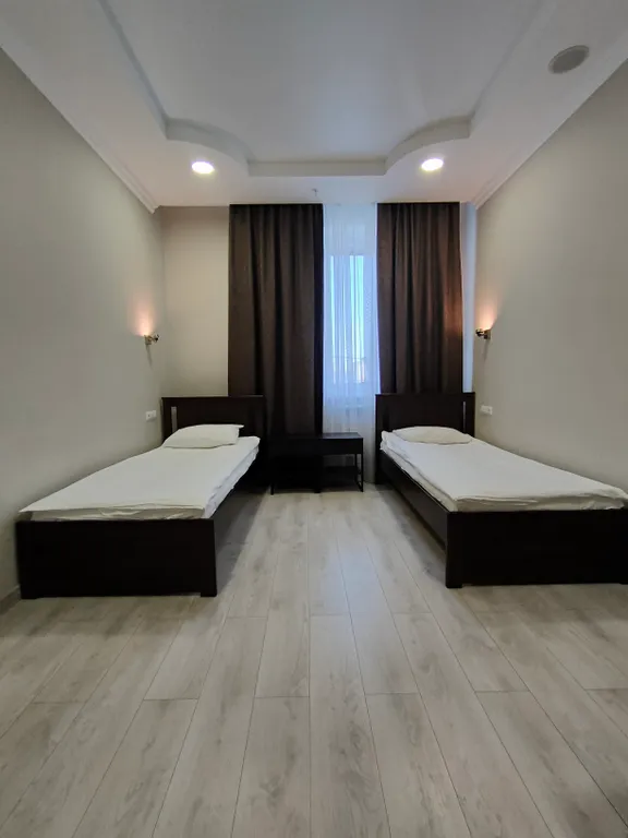 Номер в отеле с 2 отдельными кроватями и кондиционером