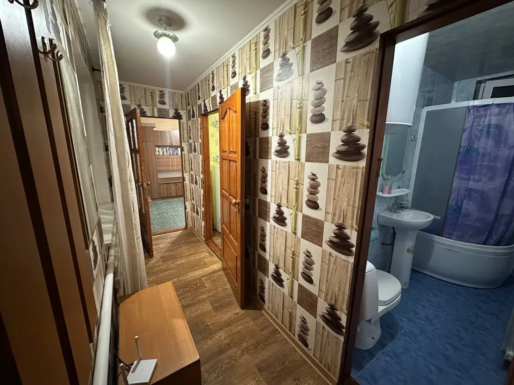 Небольшой гостевой дом со встроенной кухней на берегу моря