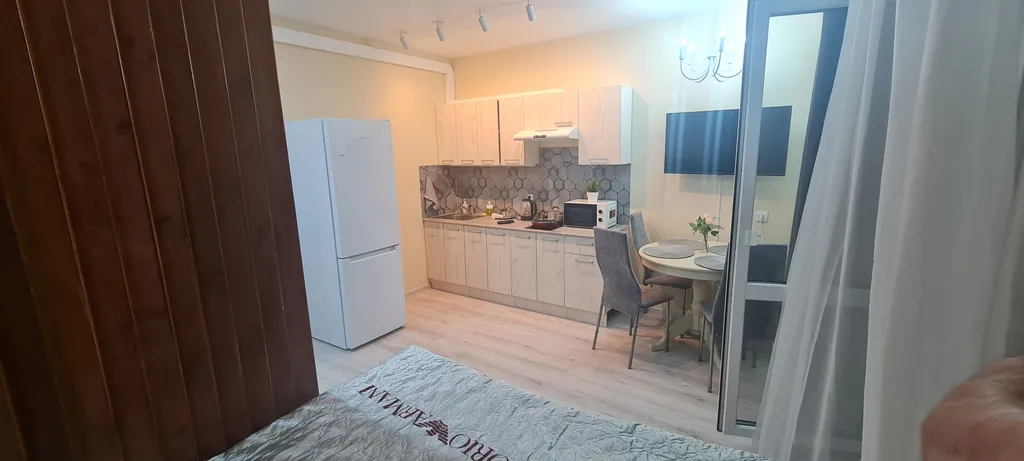 Уютная квартира-студия в новом ЖК недалеко от центра города