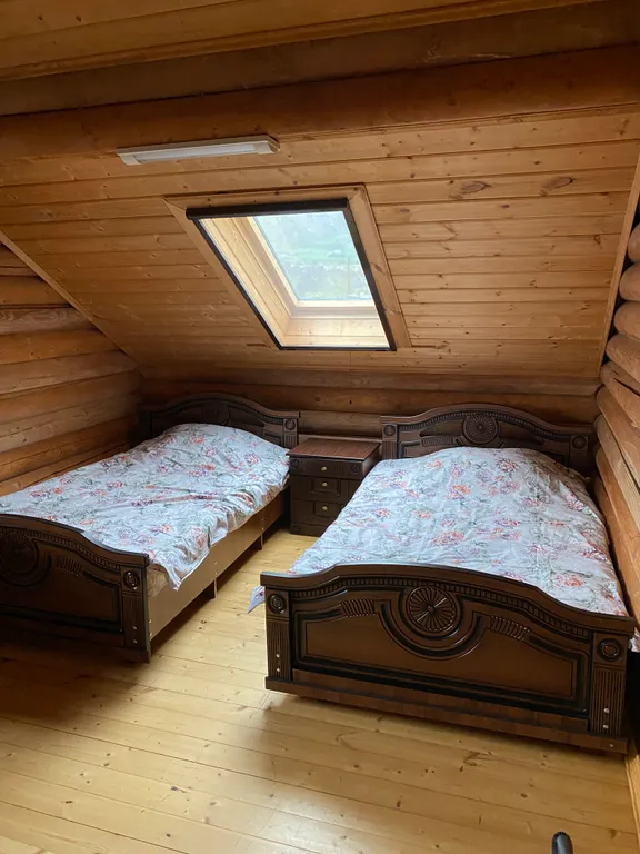 Двухэтажный дом из сруба в живописном месте