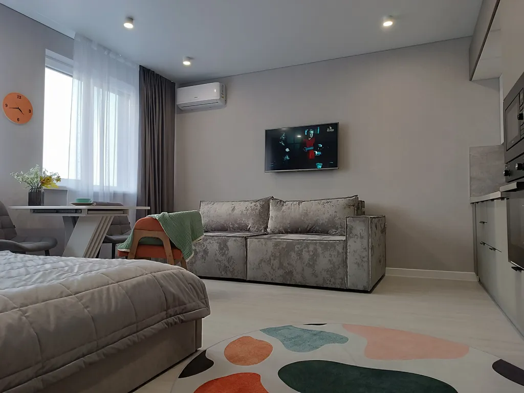 Просторная студия с 4-х местным размещением с видом на город