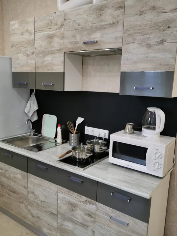 Квартира Квартира Уютная студия рядом с ТРЦ Мандарин — Сириус