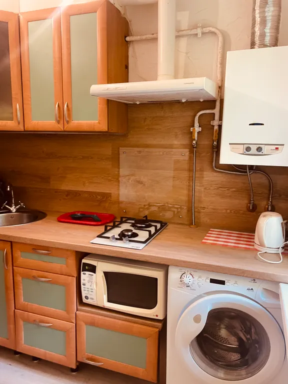 Квартира с виноградными гроздьями в центре