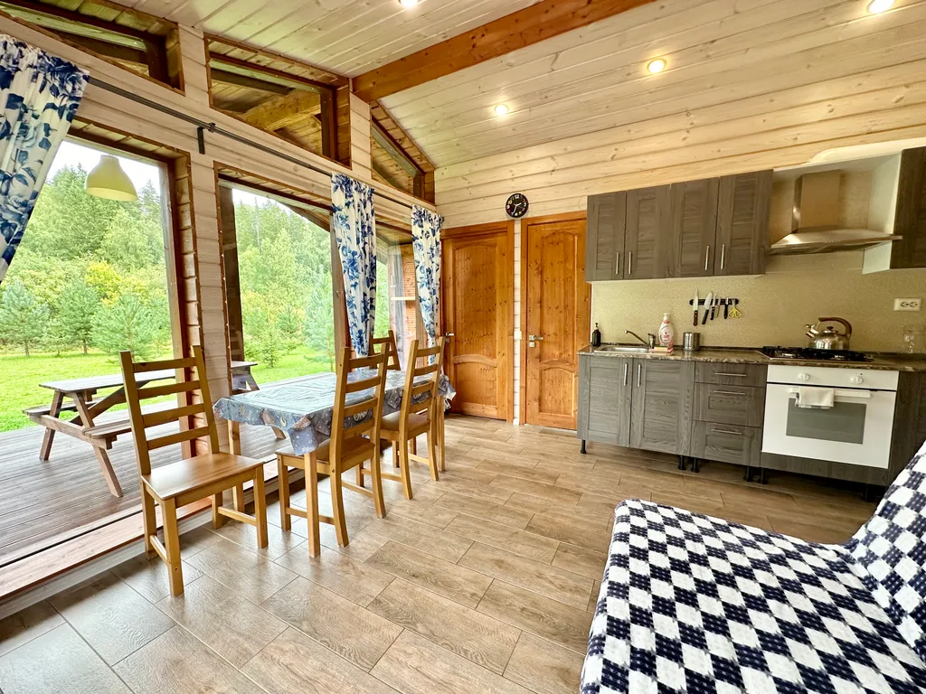 Коттедж с сауной и панорамным остеклением