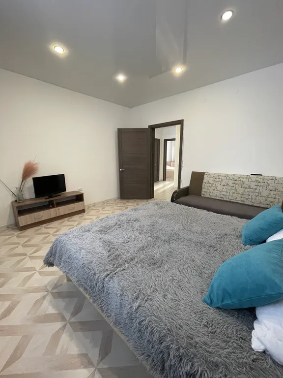 Квартира с двумя двухспальными кроватями