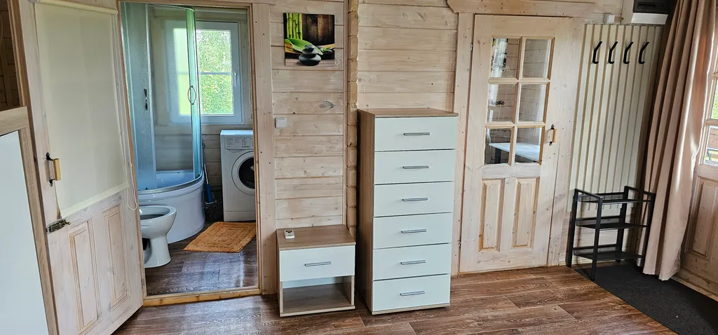 Коттедж Уютный домик на большом участке у озера — Никулино