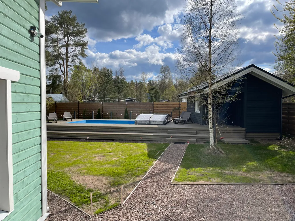 Коттедж Дом с бассейном в Карелии — Деревянное