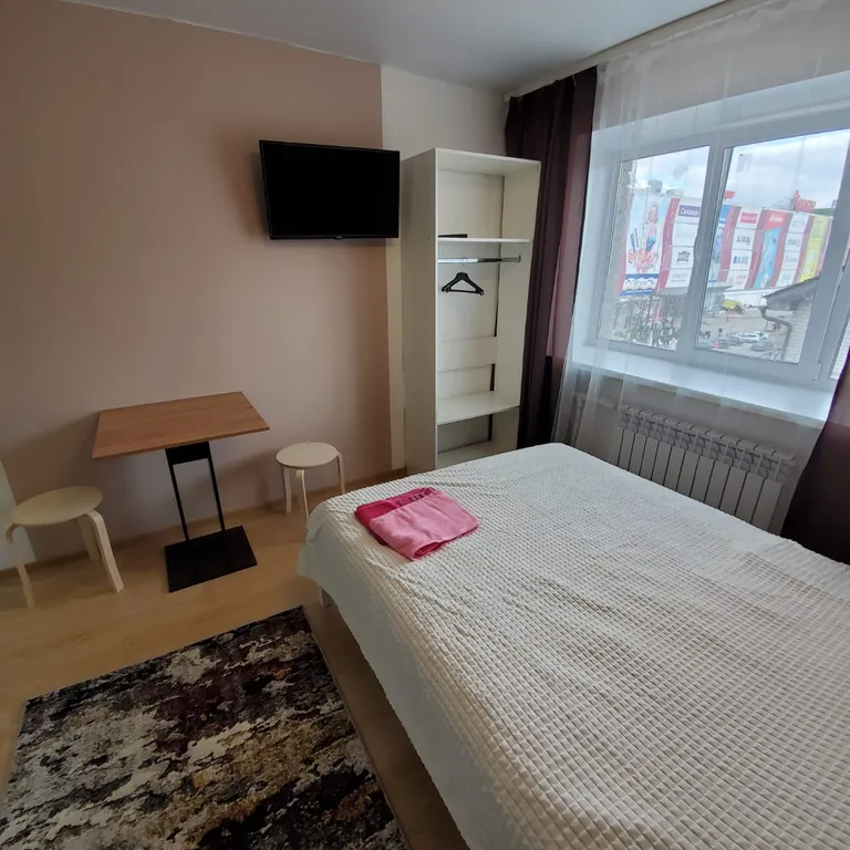 Апартаменты " Как дома" Студия 12 рядом с университетом.