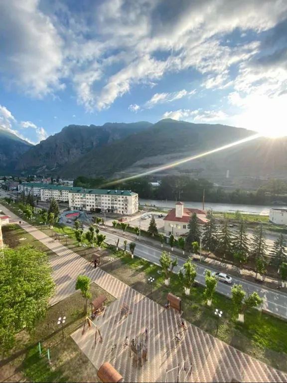 Уютная квартира в центре города с видом на горы