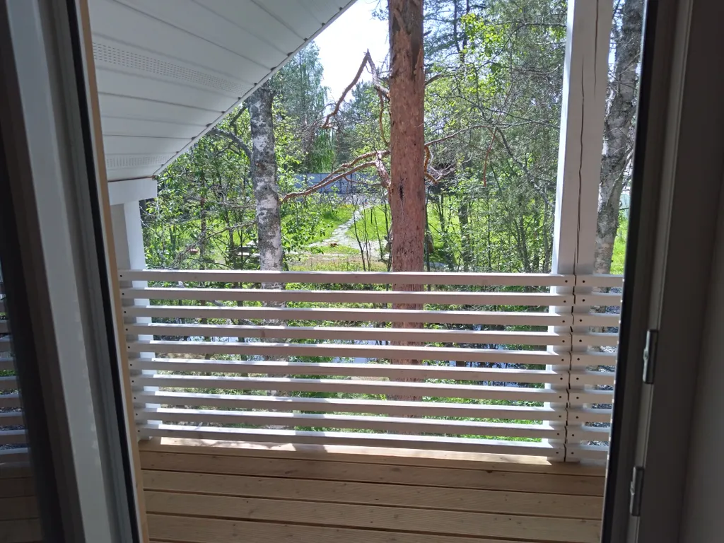 Дом с балконом