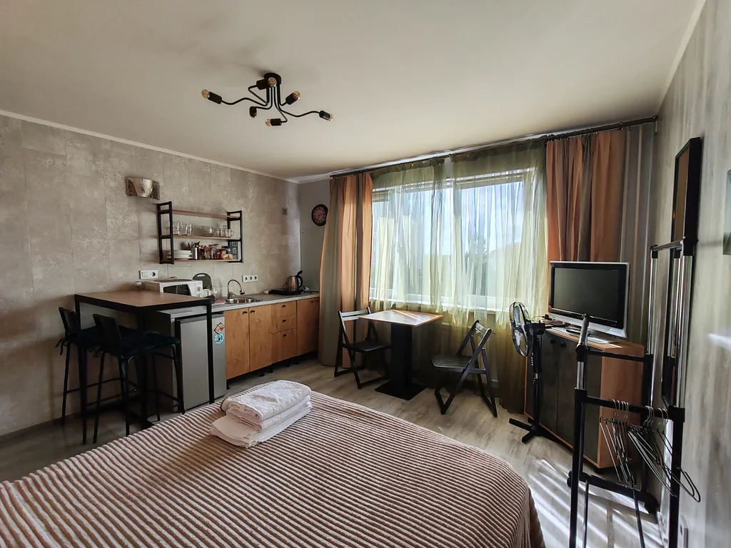 Видовые апартаменты лофт - студия в туристическом центре