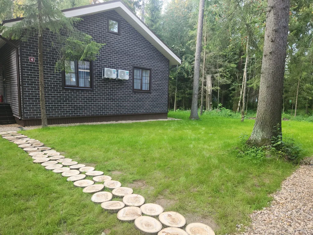 Коттедж Коттедж в Forest house с сауной в лесу — Никулино