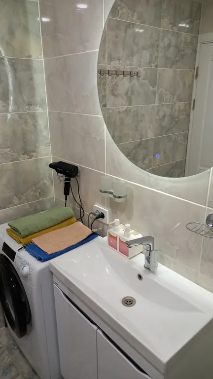 Новая трехкомнатная квартира в самом центре с видом на площадь Победы