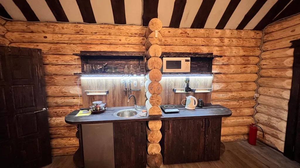 Рубленный дом - баня с террасой