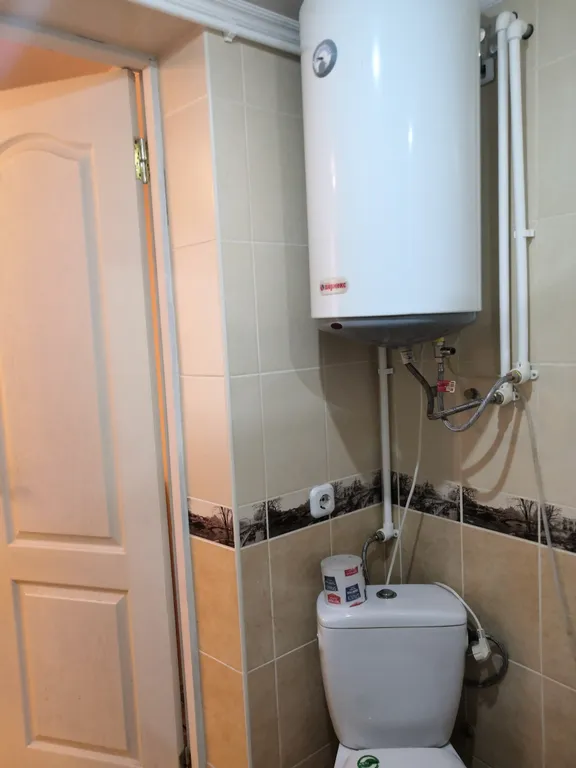 Уютный номер в коттедже в центре города.