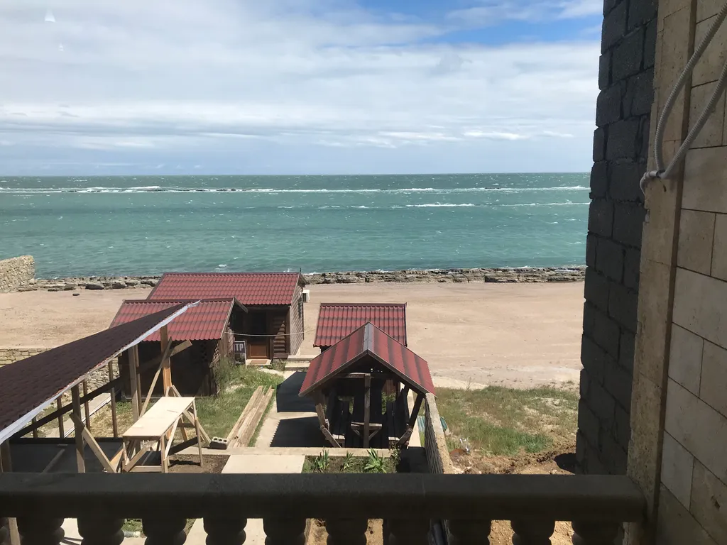 Квартира с видом на море, на берегу моря