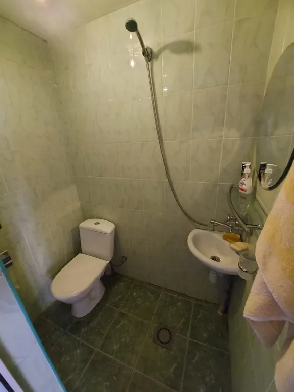 Дом в центре города на набережной реки Терек